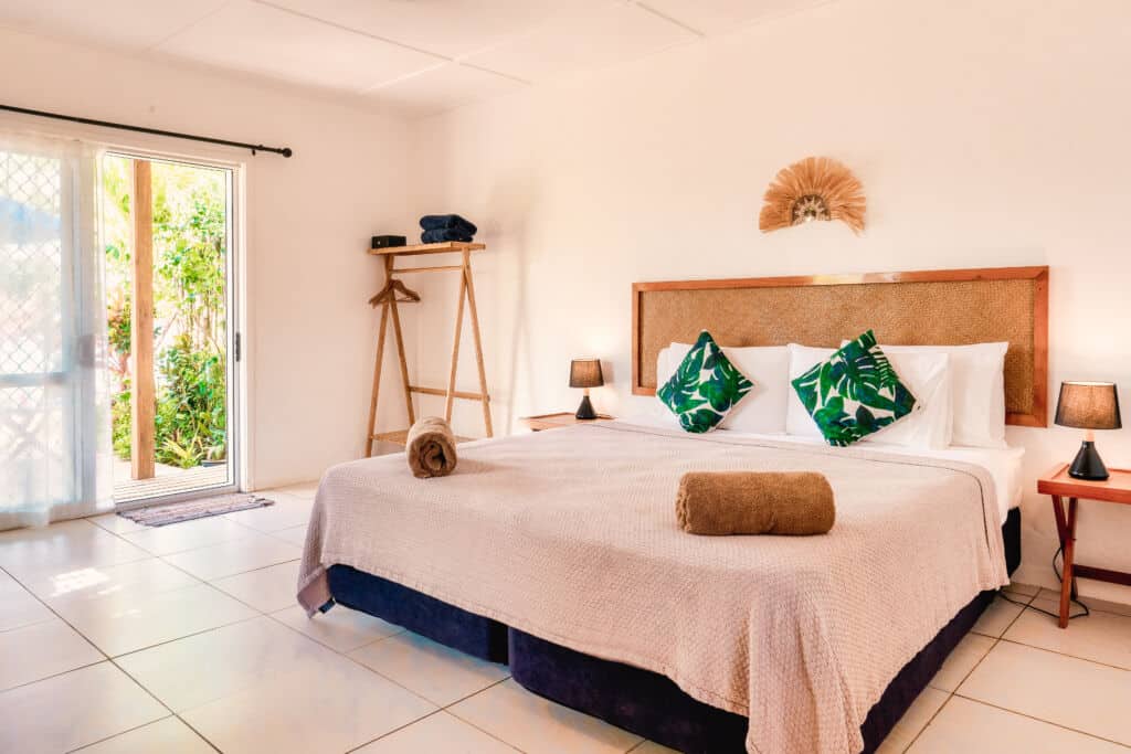 Guest room with garden doors at Mystic Sands